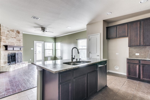 2520 Sabine Cir, Royse City, TX 75189 - kitchen featuring a sink, dishwasher, open floor plan, a ceiling fan, and light stone counters