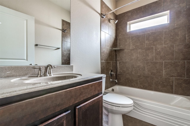 2520 Sabine Cir, Royse City, TX 75189 - bathroom with toilet, tub / shower combination, vanity, tile patterned floors, and a textured wall