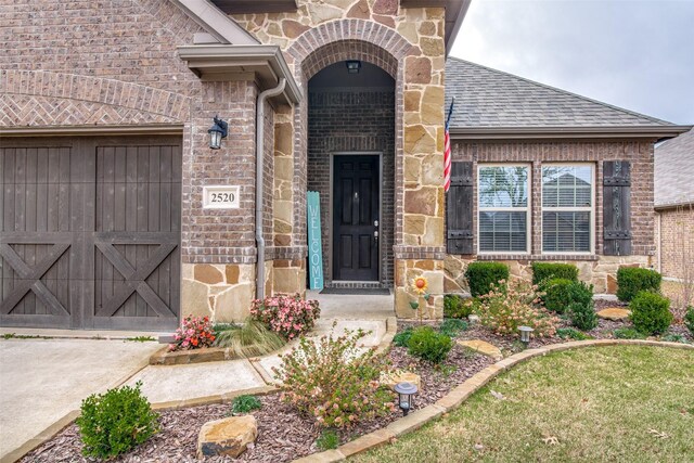 2520 Sabine Cir, Royse City, TX 75189 - entrance to property featuring brick siding, stone siding, and roof with shingles