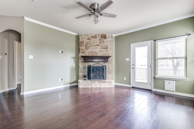 2520 Sabine Cir, Royse City, TX 75189 - unfurnished living room featuring crown molding, ceiling fan, a fireplace, wood finished floors, and baseboards