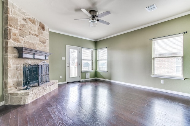 2520 Sabine Cir, Royse City, TX 75189 - unfurnished living room with ornamental molding, ceiling fan, a fireplace, wood finished floors, and baseboards