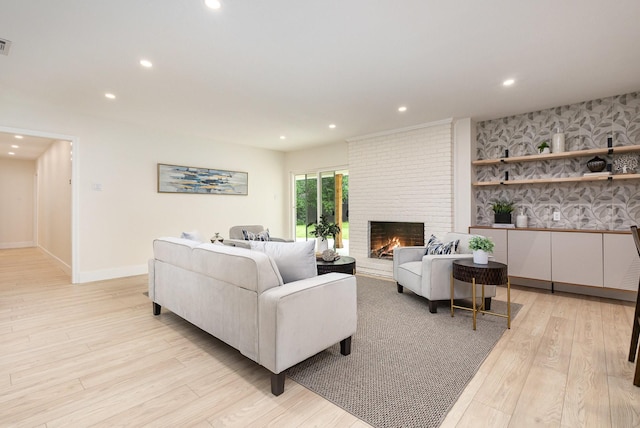 7818 Rolling Acres Dr, Dallas, TX 75248 - living room with recessed lighting, light wood-type flooring, a brick fireplace, and baseboards