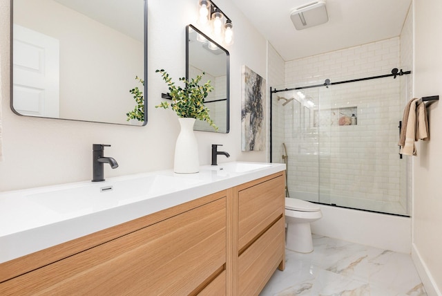 7818 Rolling Acres Dr, Dallas, TX 75248 - full bathroom with toilet, double vanity, marble finish floors, and bath / shower combo with glass door