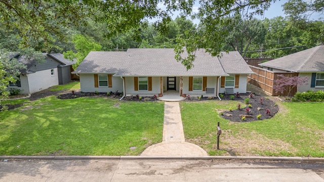 7818 Rolling Acres Dr, Dallas, TX 75248 - single story home with covered porch, brick siding, roof with shingles, and a front yard