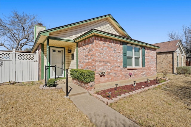 2311 Markland St, Irving, TX 75060 - view of front facade featuring a chimney and brick siding