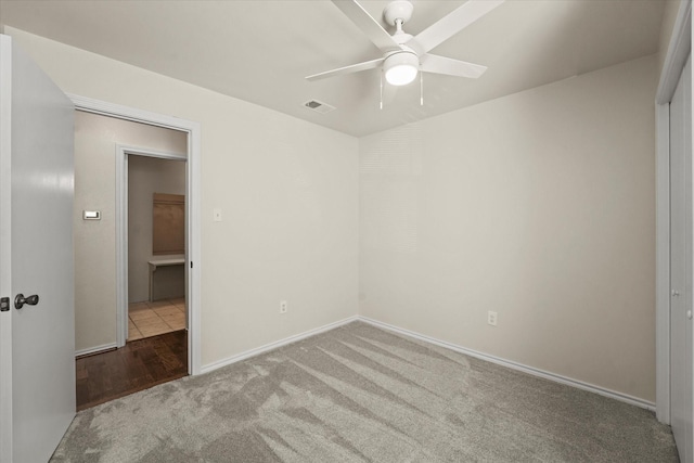 2311 Markland St, Irving, TX 75060 - carpeted empty room with a ceiling fan and baseboards