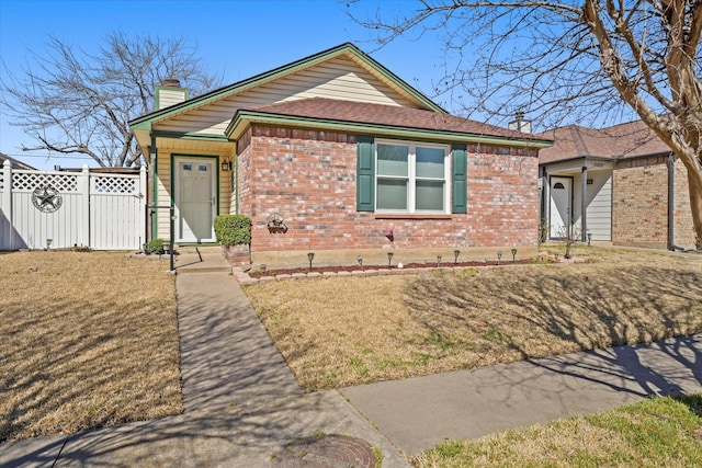 2311 Markland St, Irving, TX 75060 - ranch-style house featuring brick siding and a chimney