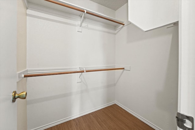 2311 Markland St, Irving, TX 75060 - spacious closet with wood finished floors
