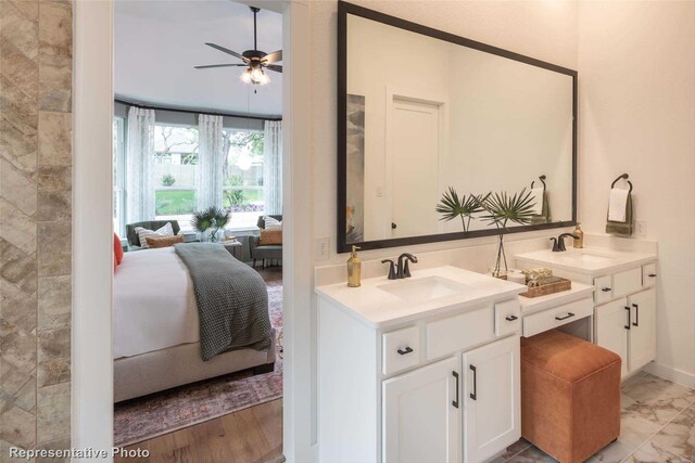 8413 Peach St, Justin, TX 76247 - full bathroom with ensuite bathroom, two vanities, and ceiling fan