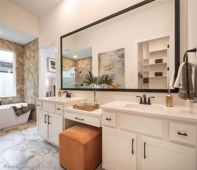 8413 Peach St, Justin, TX 76247 - bathroom with vanity, a soaking tub, a shower, and marble finish flooring