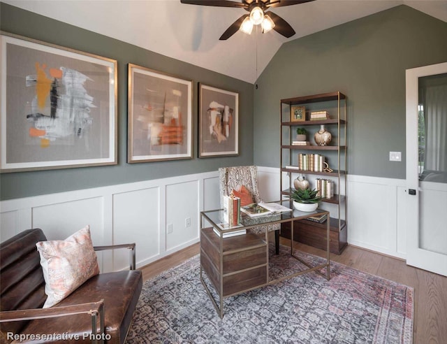 8413 Peach St, Justin, TX 76247 - office space featuring wood finished floors, a ceiling fan, lofted ceiling, a wainscoted wall, and a decorative wall