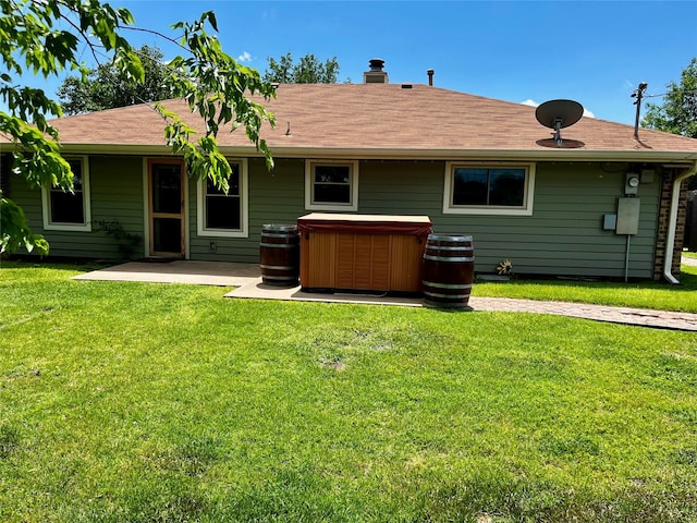 617 Reed St, Roanoke, TX 76262 - rear view of house featuring a hot tub, a chimney, a patio, and a yard