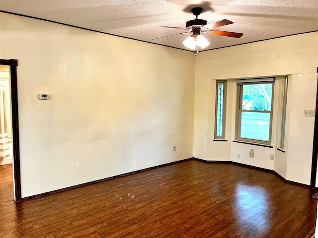 617 Reed St, Roanoke, TX 76262 - unfurnished room with ceiling fan, wood finished floors, a textured ceiling, and baseboards
