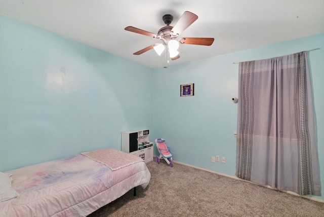 213 Lacewell St, Jacksboro, TX 76458 - carpeted bedroom with a ceiling fan and baseboards