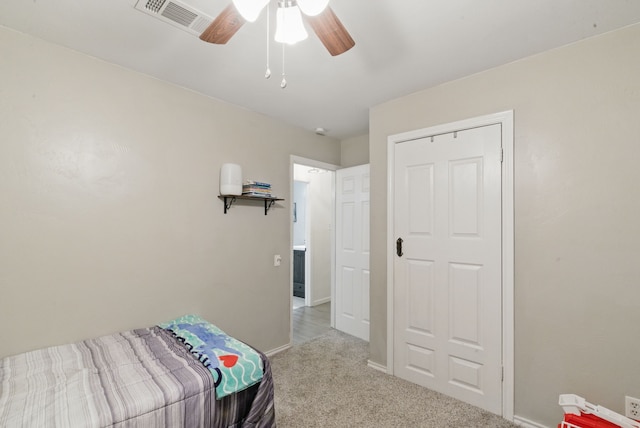 213 Lacewell St, Jacksboro, TX 76458 - carpeted bedroom featuring baseboards and a ceiling fan