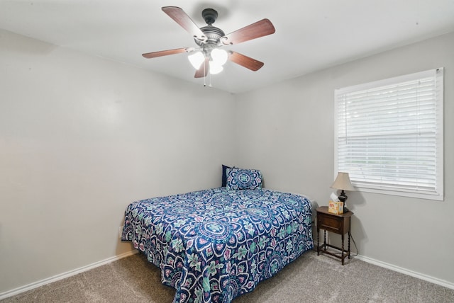 213 Lacewell St, Jacksboro, TX 76458 - carpeted bedroom with baseboards and ceiling fan