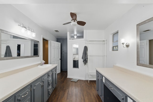 213 Lacewell St, Jacksboro, TX 76458 - full bath with wood finished floors, vanity, a ceiling fan, and baseboards