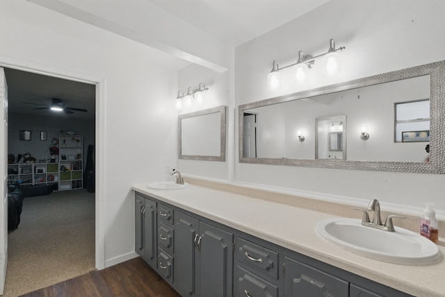 213 Lacewell St, Jacksboro, TX 76458 - full bathroom featuring double vanity and wood finished floors