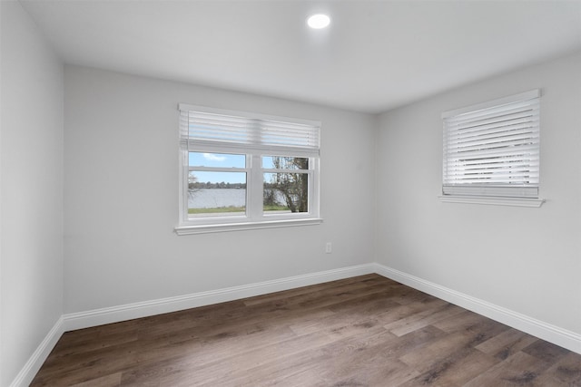 16030 Saint Paul Dr, Caney City, TX 75148 - unfurnished room featuring wood finished floors and baseboards