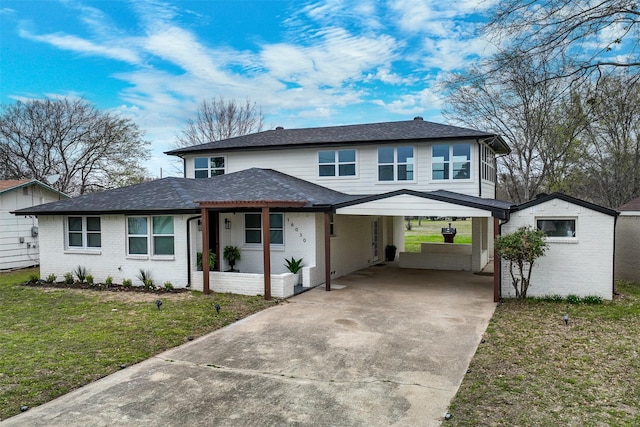 16030 Saint Paul Dr, Caney City, TX 75148 - view of front of house with a front yard, an attached carport, driveway, brick siding, and roof with shingles