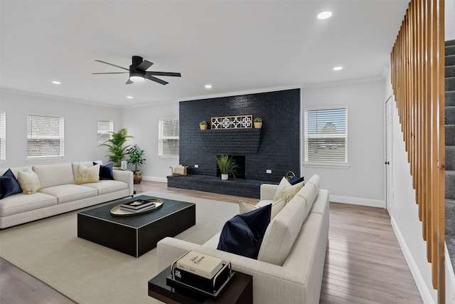 16030 Saint Paul Dr, Caney City, TX 75148 - living area with stairs, crown molding, wood finished floors, ceiling fan, and recessed lighting