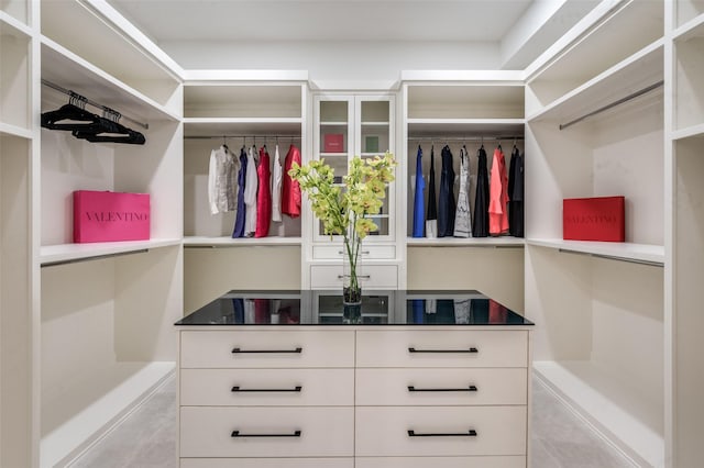 6075 Jordan Way, Frisco, TX 75034 - walk in closet featuring tile patterned flooring