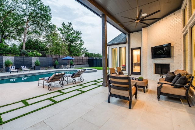 6075 Jordan Way, Frisco, TX 75034 - fenced backyard with an outdoor living space, a patio, a ceiling fan, and a pool with connected hot tub