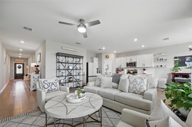 1229 Sequoia Ln, Princeton, TX 75407 - living room featuring light wood-type flooring, recessed lighting, and ceiling fan