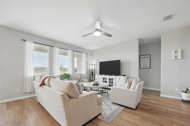 1229 Sequoia Ln, Princeton, TX 75407 - living area with light wood finished floors, baseboards, and a ceiling fan