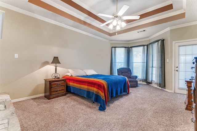2206 Virginia Ln, Haslet, TX 76052 - carpeted bedroom with a tray ceiling, ornamental molding, baseboards, and a ceiling fan