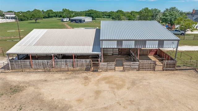 2206 Virginia Ln, Haslet, TX 76052 - view of front of house with metal roof, an exterior structure, and an outbuilding
