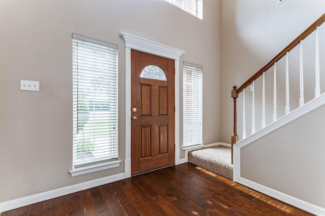 2206 Virginia Ln, Haslet, TX 76052 - foyer entrance featuring stairway, dark wood-style flooring, plenty of natural light, and baseboards