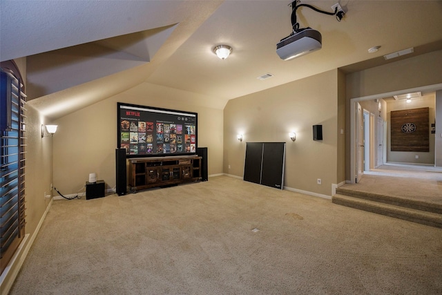 7811 Keith Ln, Sachse, TX 75048 - carpeted home theater with lofted ceiling and baseboards
