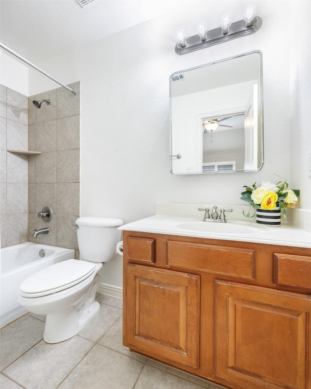 7811 Keith Ln, Sachse, TX 75048 - full bathroom featuring toilet, vanity, tile patterned flooring, shower / bathtub combination, and a ceiling fan