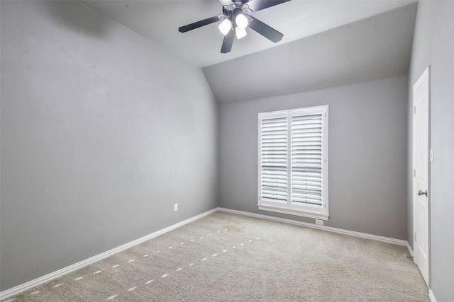 7811 Keith Ln, Sachse, TX 75048 - carpeted spare room with baseboards, a ceiling fan, and vaulted ceiling
