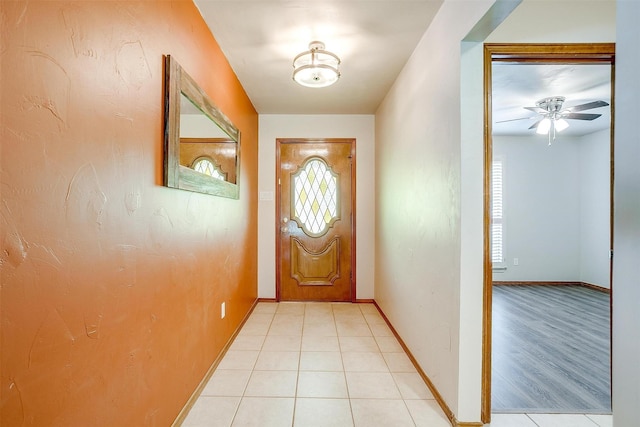 1103 Dirkson St, Weatherford, TX 76086 - doorway to outside with baseboards, light tile patterned floors, and ceiling fan