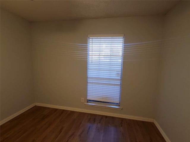 12480 Abrams Rd, Dallas, TX 75243 - unfurnished room featuring wood finished floors and baseboards