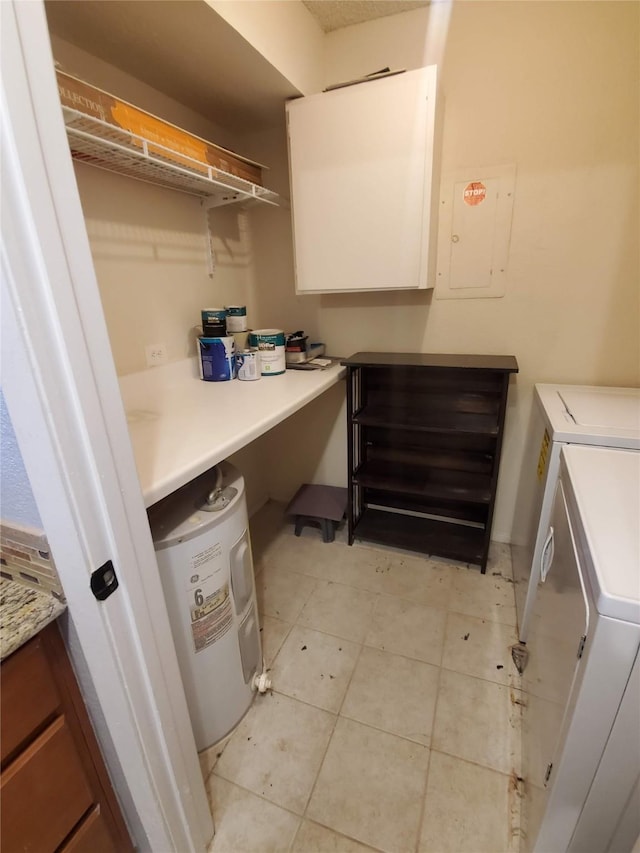 12480 Abrams Rd, Dallas, TX 75243 - laundry room with electric panel, water heater, cabinet space, light tile patterned flooring, and washer / dryer