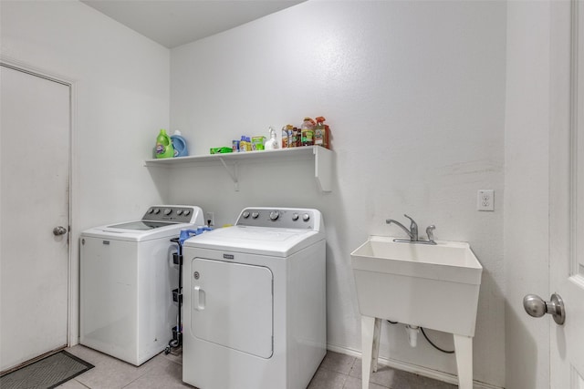 7828 Tudanca Trl, Fort Worth, TX 76131 - laundry area featuring independent washer and dryer and light tile patterned floors