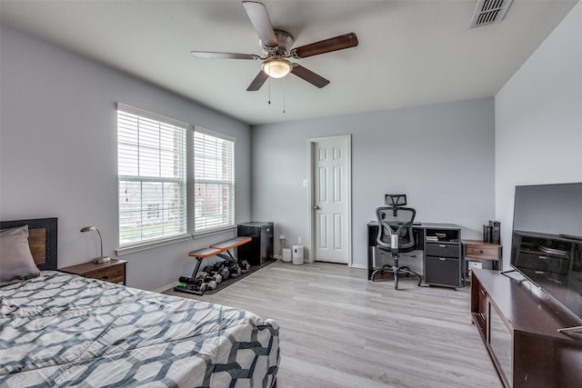 7828 Tudanca Trl, Fort Worth, TX 76131 - bedroom featuring light wood-type flooring, a desk, ceiling fan, and baseboards