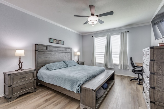 7828 Tudanca Trl, Fort Worth, TX 76131 - bedroom with light wood-type flooring, ornamental molding, baseboards, a desk, and a ceiling fan