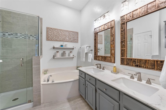 11505 Canoe Rd, Frisco, TX 75035 - full bathroom featuring a garden tub, a stall shower, and double vanity