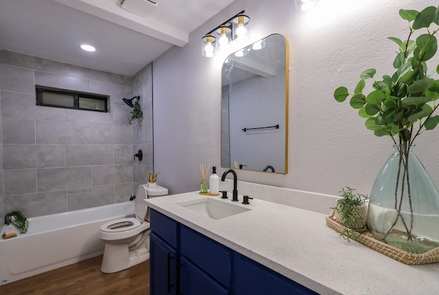 6519 Club Wood, Dallas, TX 75237 - full bath with wood finished floors, vanity, toilet, tub / shower combination, and recessed lighting