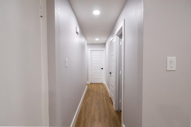 6519 Club Wood, Dallas, TX 75237 - hall featuring wood finished floors, baseboards, and recessed lighting