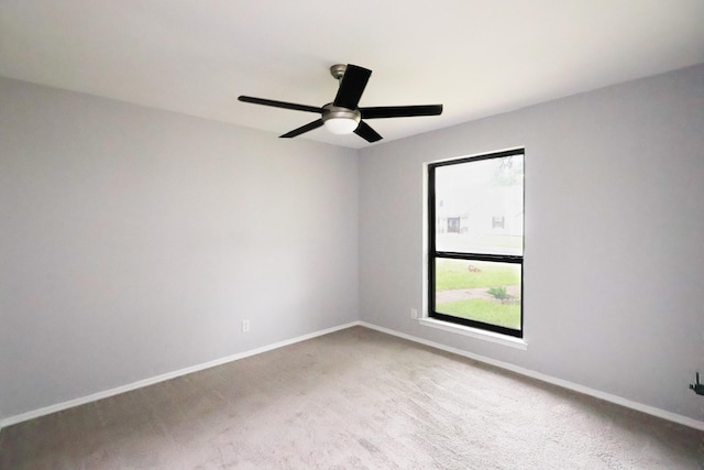6519 Club Wood, Dallas, TX 75237 - empty room featuring ceiling fan, baseboards, and carpet