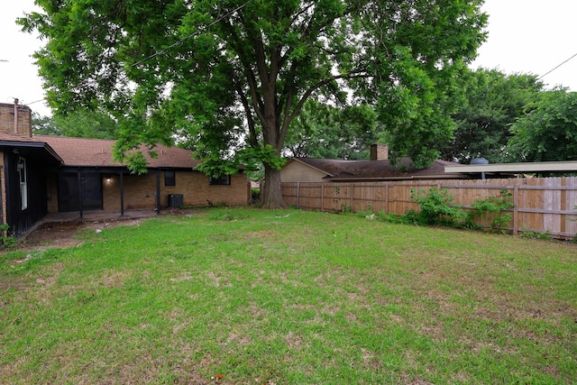 6519 Club Wood, Dallas, TX 75237 - view of yard featuring central AC unit