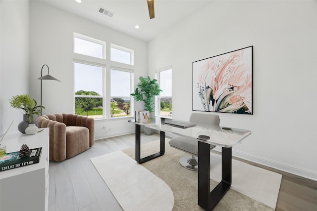 3705 Melville Cir, Flower Mound, TX 75022 - office space with wood finished floors, baseboards, recessed lighting, ceiling fan, and a high ceiling