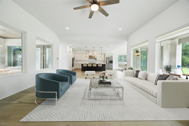 3705 Melville Cir, Flower Mound, TX 75022 - living area with a ceiling fan, light wood-style flooring, and recessed lighting