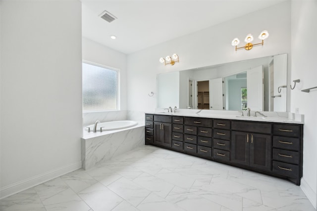 3705 Melville Cir, Flower Mound, TX 75022 - full bathroom featuring marble finish flooring, double vanity, a garden tub, and baseboards
