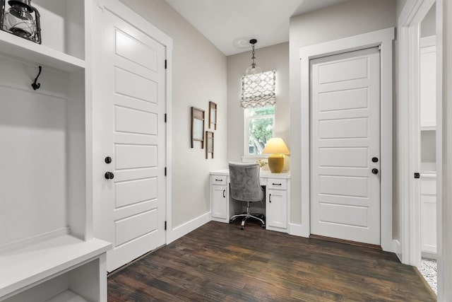 116 Estancia Ct, Decatur, TX 76234 - mudroom featuring dark wood-type flooring, built in study area, and baseboards